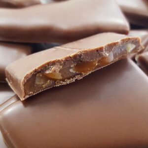 pieces of crunchy almond vegan toffee covered in vegan chocolate
